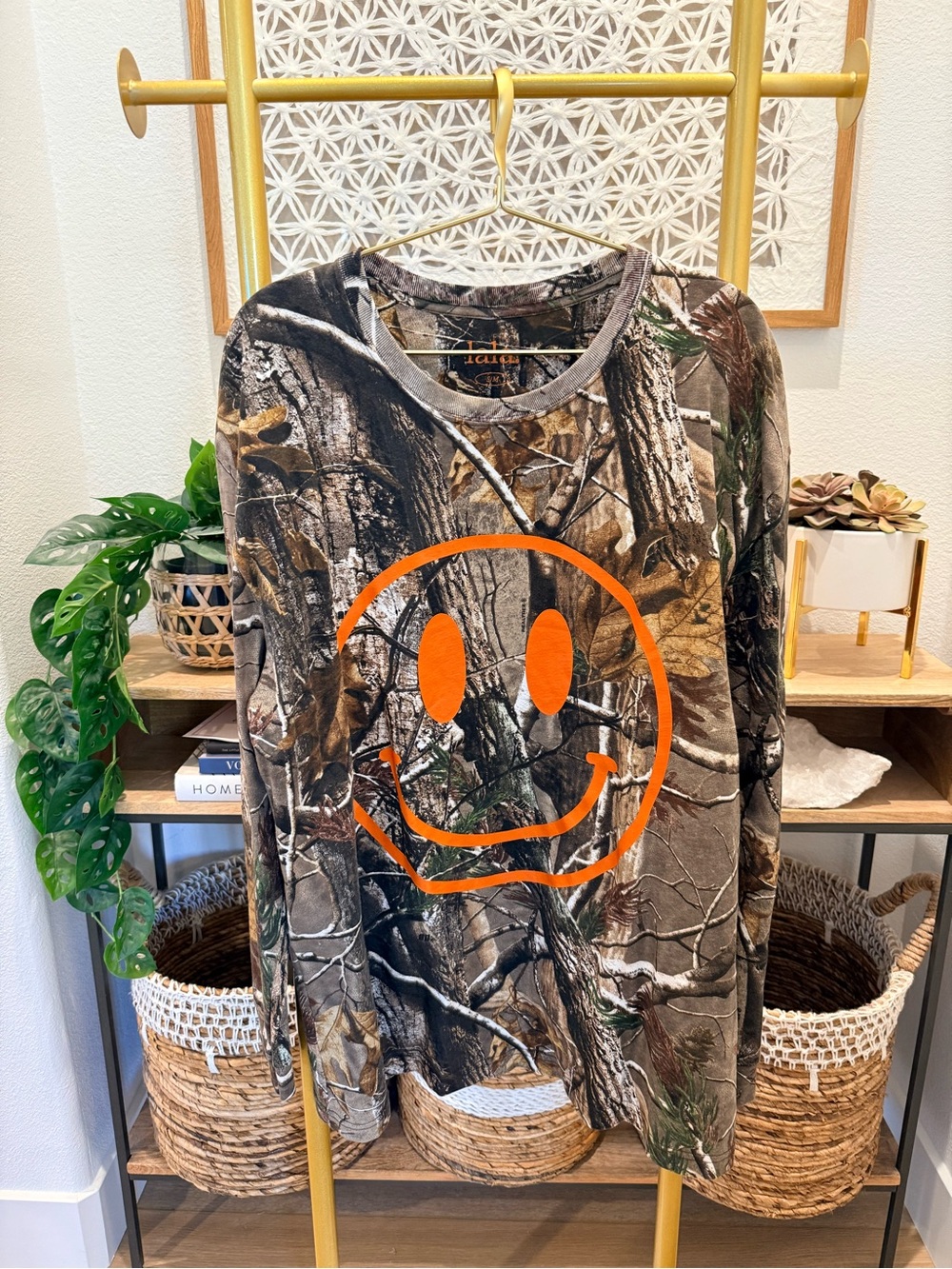 Dressed in LALA Camouflage Long-Sleeve Tee with Orange Smiley